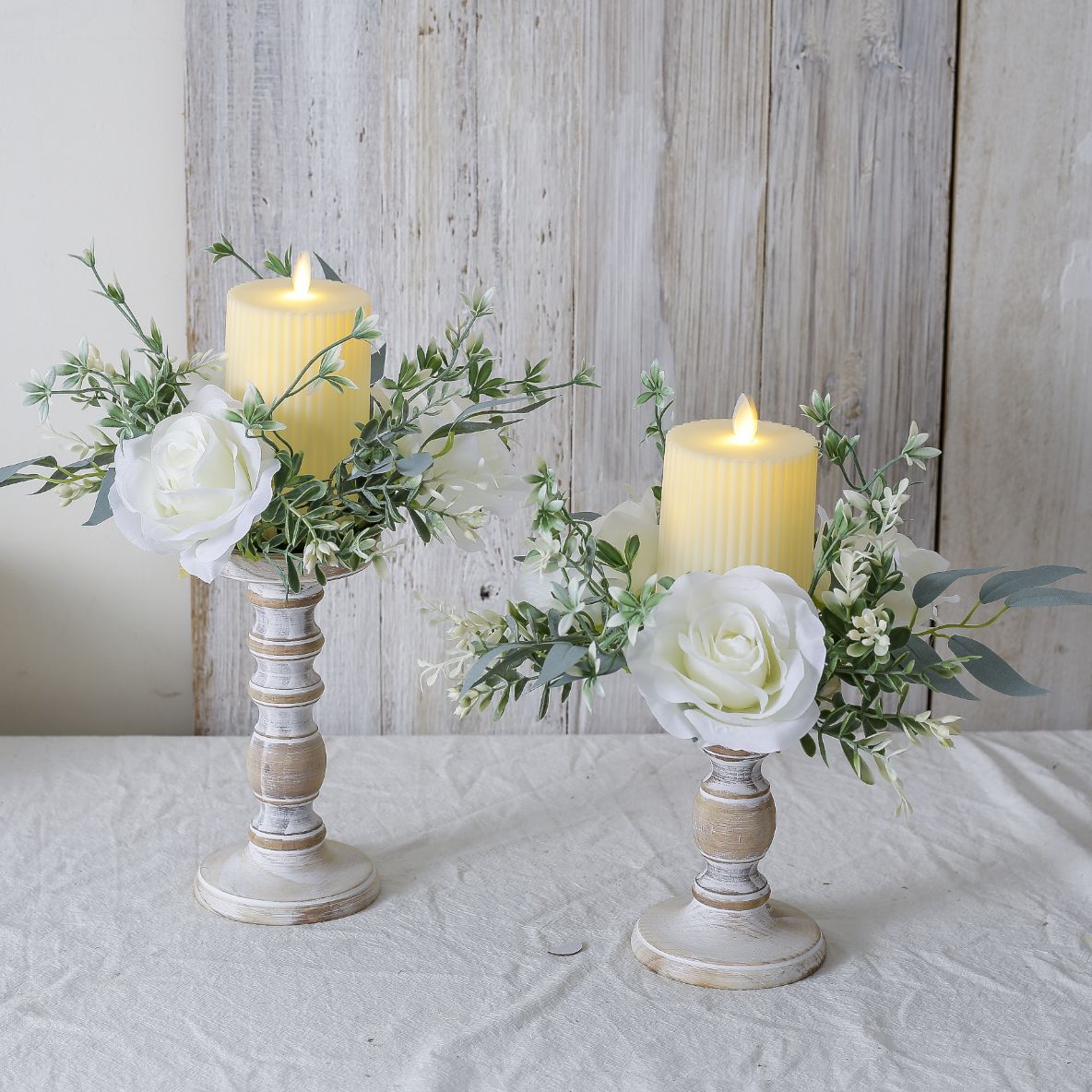 Distressed wood candlestick decor with white rose wedding flowers artificial for wedding reception table styling