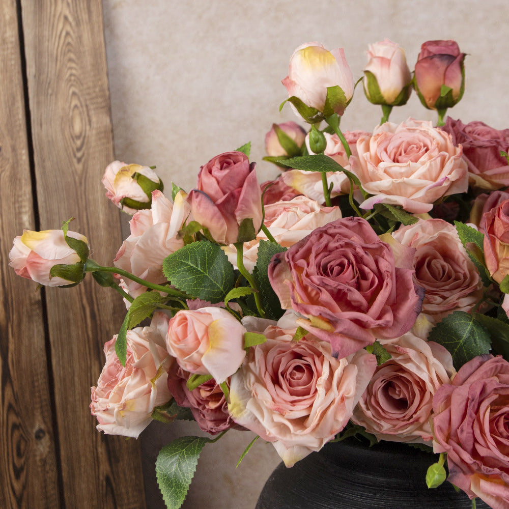 Blush pink dusty rose bouquet fake flowers arranged in black ceramic pot for rustic entryway home decor