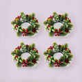 4 pack christmas candle ring wreath with red berries, artificial burgundy roses, eucalyptus leaves and pine sprigs on light grey background