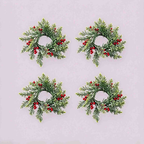 4 pack artificial cypress red berry candle rings, flat lay product display on light grey background for Christmas table decor