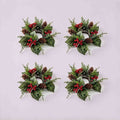4 pack artificial pinecone red berry Christmas candle rings, flat lay product display on light grey background