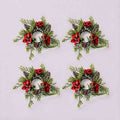 4 pack artificial Christmas candle rings with red poinsettia blooms, frosted pinecones and cypress greenery, product shot on light grey background