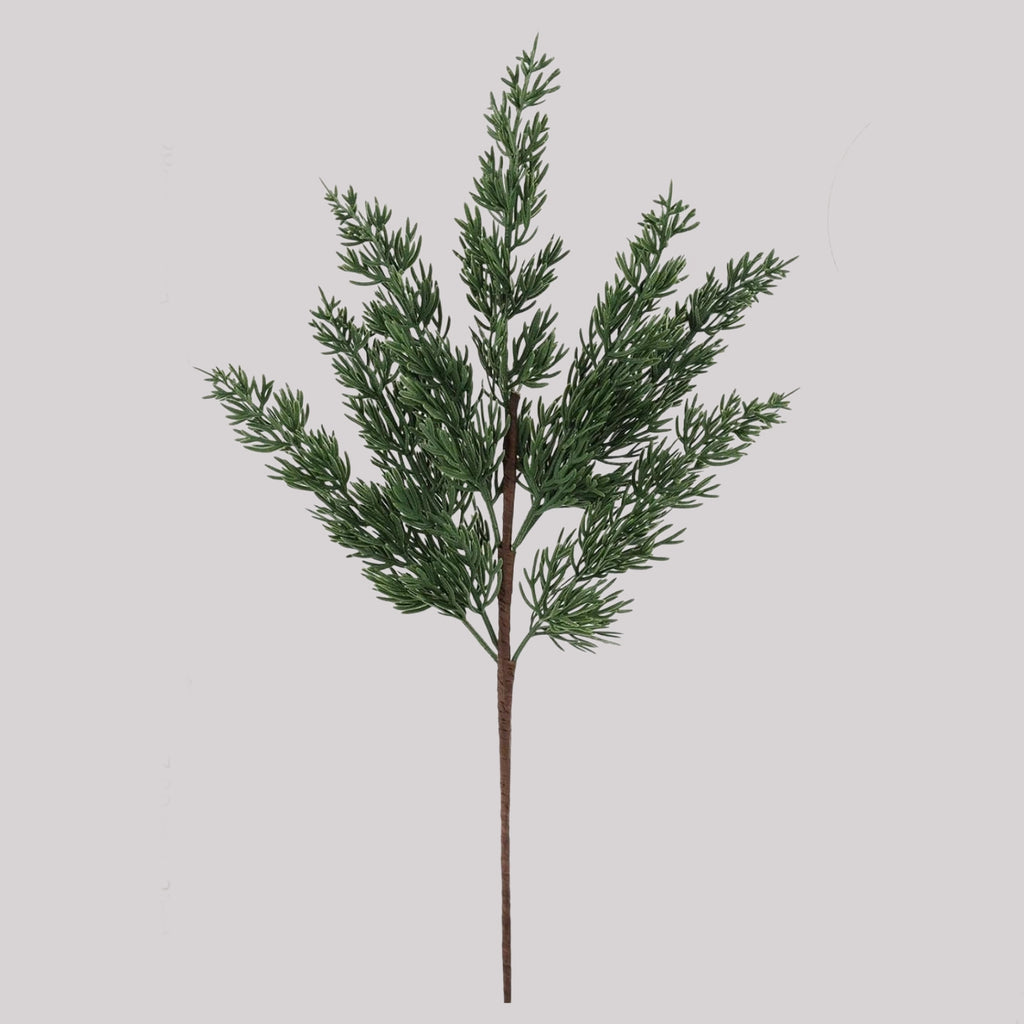 Single stem of artificial cedar pine with realistic green needle foliage and brown stem displayed on light gray background for ecommerce product detail