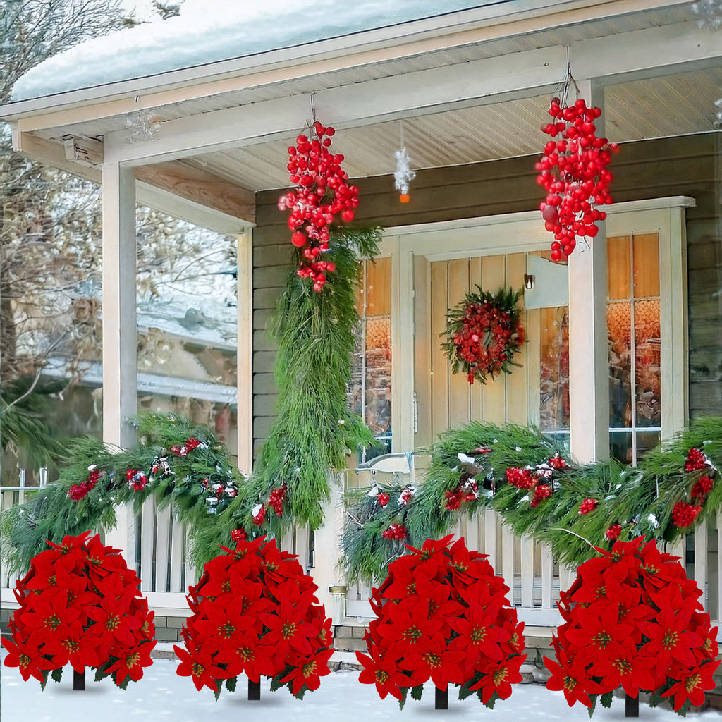 Group of lush poinsettia artificial trees for full snow yard and front entry curb decor layout