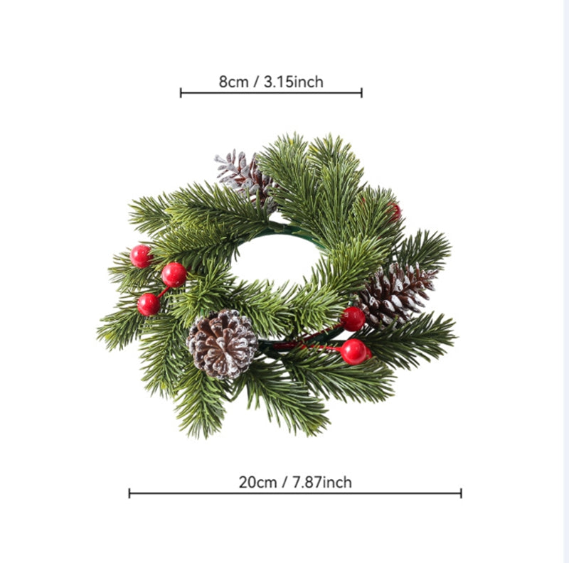 Christmas candle ring with artificial pine sprigs, frosted pinecones and bright red berries, dimension markings on white background product photo