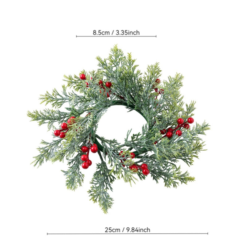 Artificial cypress and red berry candle ring wreath with size measurement markings on plain white background product shot