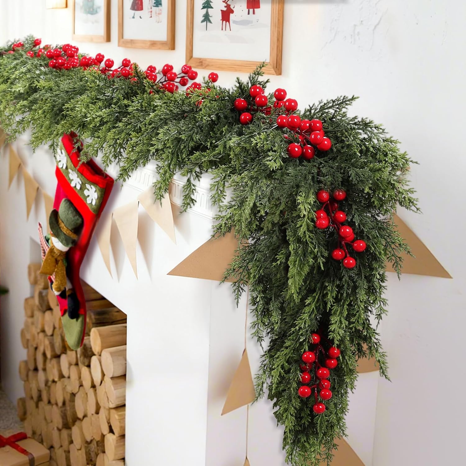 Long drooping red berry Norfolk Pine Garland arranged on white mantel with knit Christmas stocking indoor holiday decor