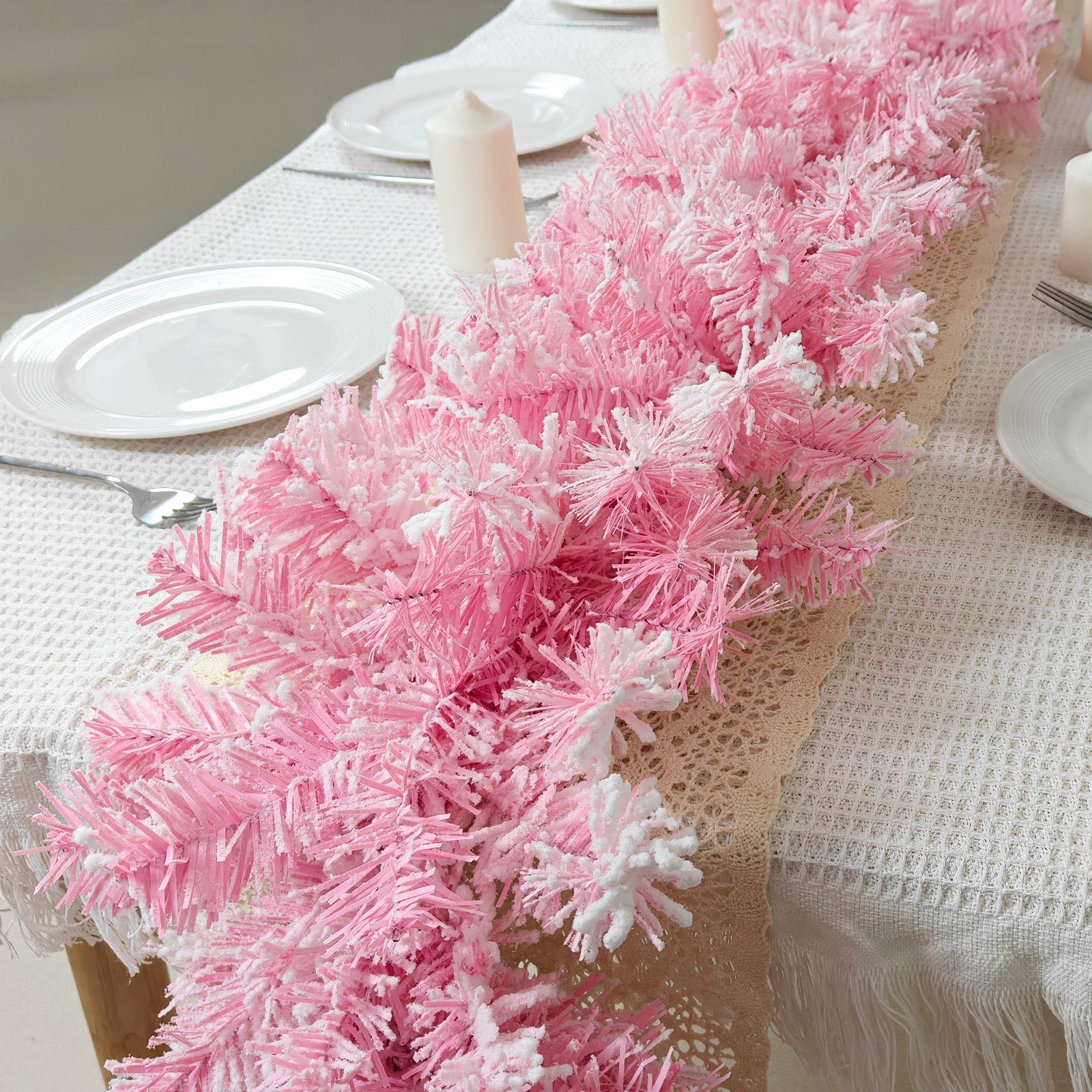 Fluffy flocked pink pine faux xmas garland laid as dining table runner on cream lace tablecloth girly decor