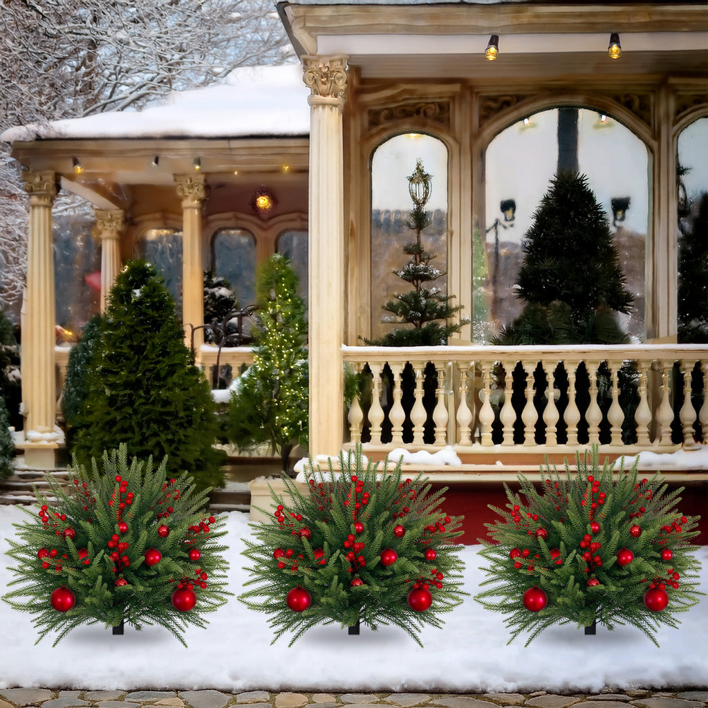 Group bushy decorated christmas trees with red berries for full winter snow yard and driveway layout