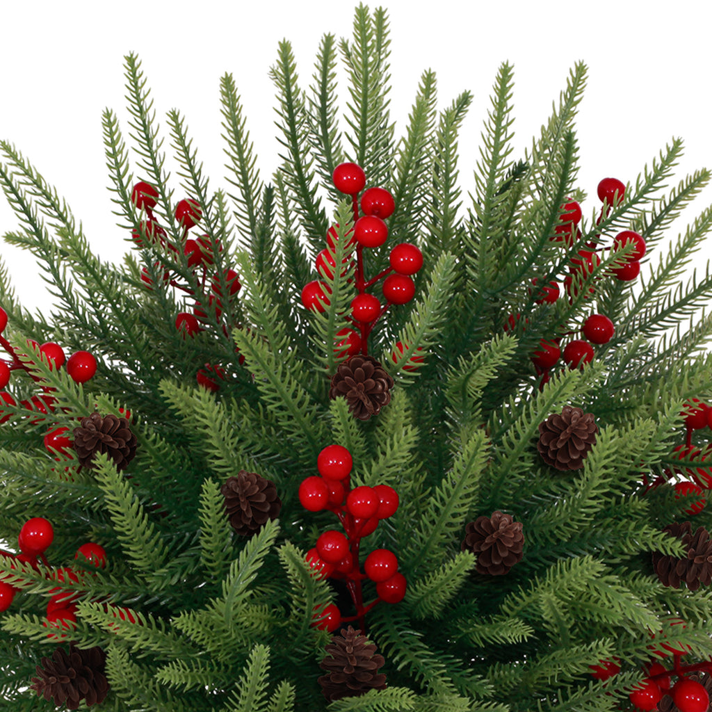Textured layered pine artificial trees with abundant red berry clusters and natural pinecone accents