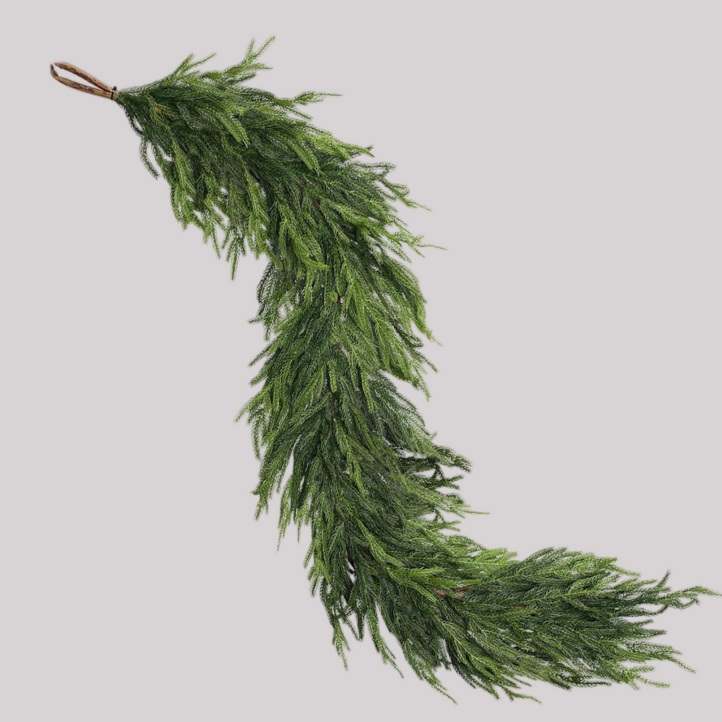 6 foot long drooping realistic Norfolk Pine Garland isolated on plain background wholesale holiday greenery
