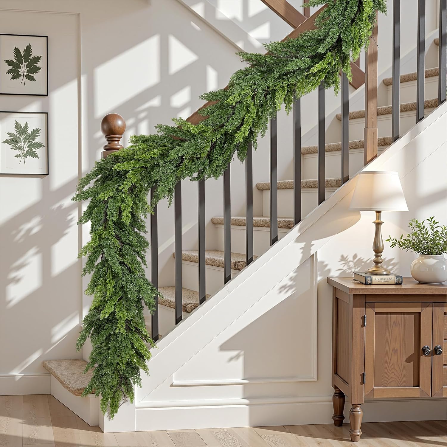 Full length lush cedar christmas garlands draped over black metal stair spindles modern farmhouse holiday decor
