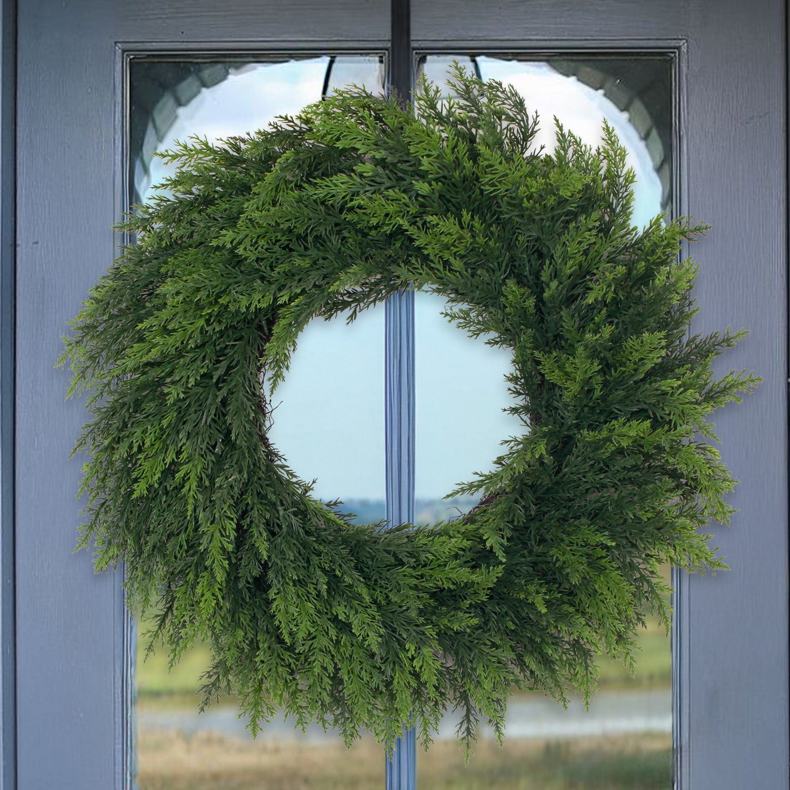 Simple drooping norfolk pine front door wreath neutral green foliage for cottage front porch curb appeal