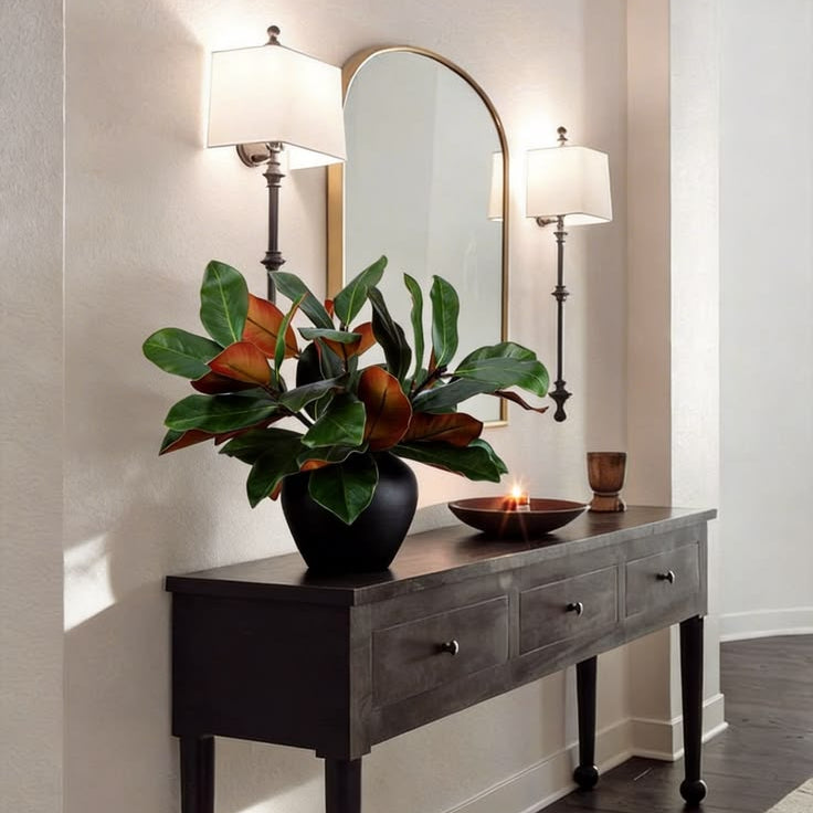 Full bushy magnolia leaf artificial plant with glossy green and rust undersides for long hallway console decor