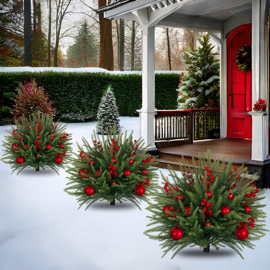 Group bushy decorated christmas trees with red berries for full winter snow yard and driveway layout